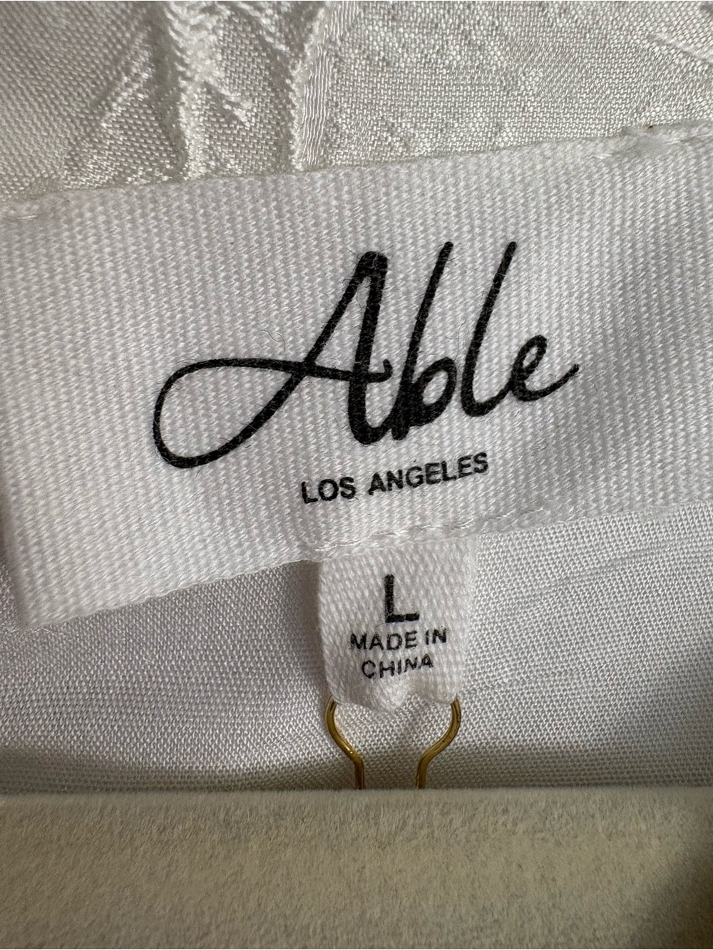 Able White Topwith Textured Label Detail - Picture 2 of 5